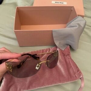 Miu Miu Gold Frame Sunglasses with Brown Lenses